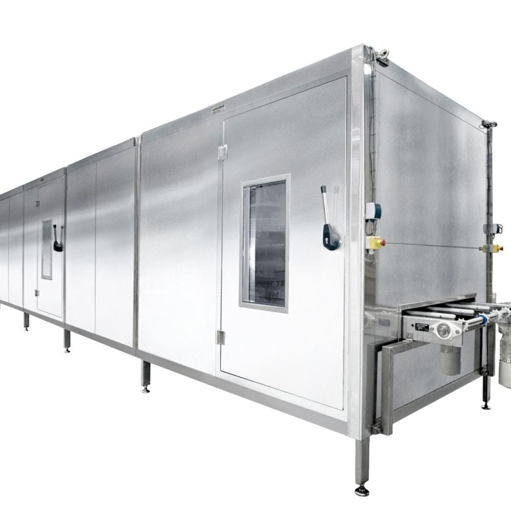 Extrufood cooling tunnel — long enclosed unit with access doors and observation windows for conditioning extruded products