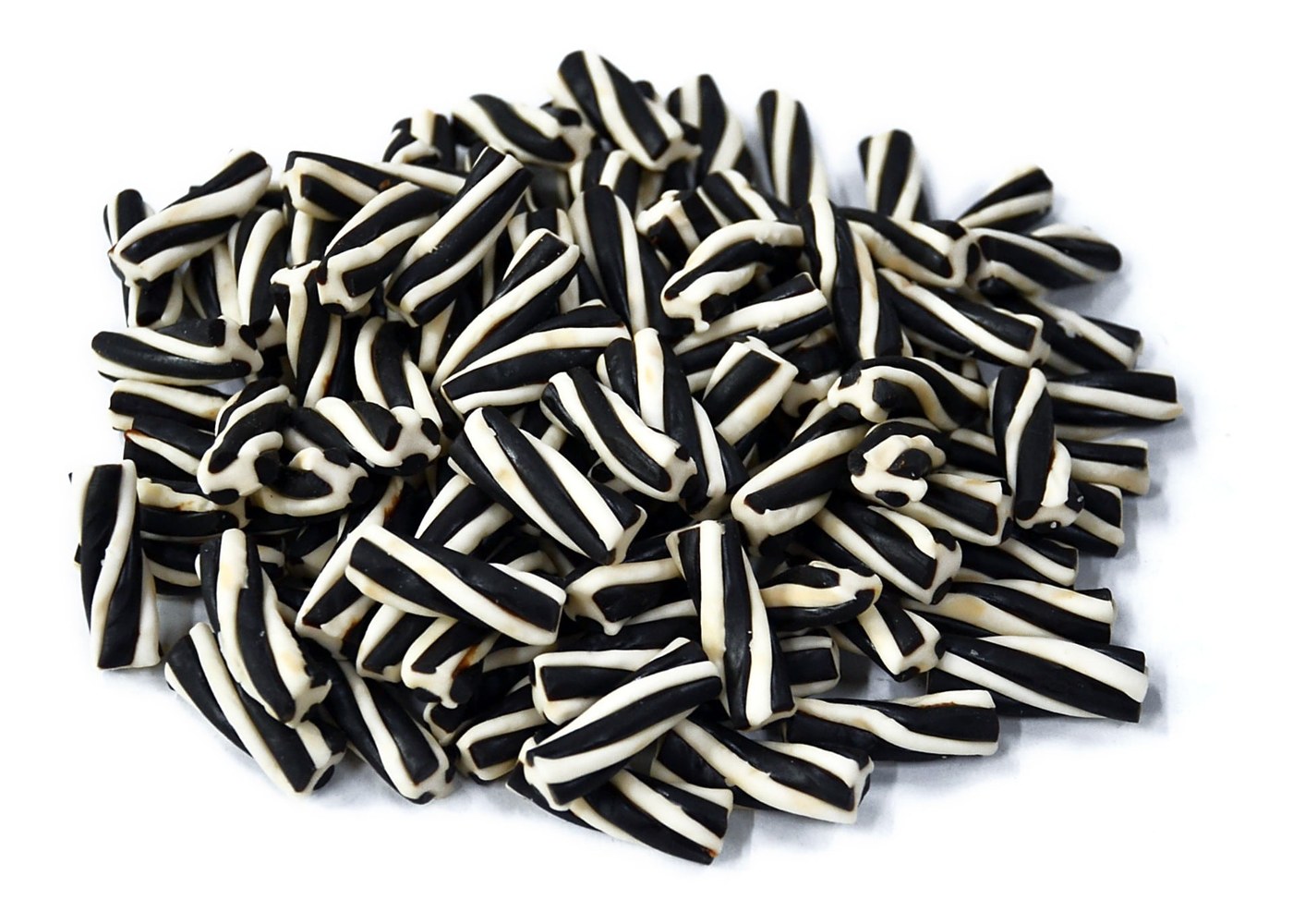 Black and white twisted licorice pieces produced with an Extrufood rotary die
